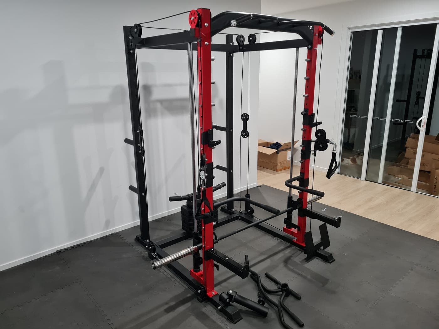 Finished power rack standing square with the cable pulleys running