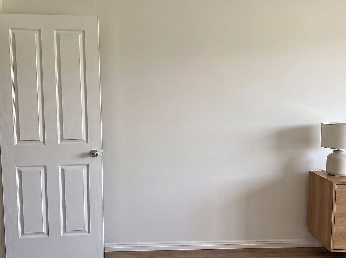 The same wall sheeted, set flush and repainted with no trace of the cutout